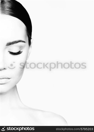 Black and white studio portrait of beautiful young woman. Beauty and care. Extension eyelashes. Spa salon