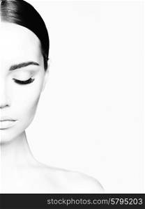 Black and white studio portrait of beautiful young woman. Beauty and care. Extension eyelashes. Spa salon