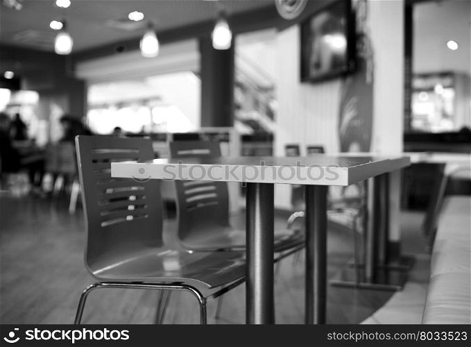 Black and white table in cafe bokeh background