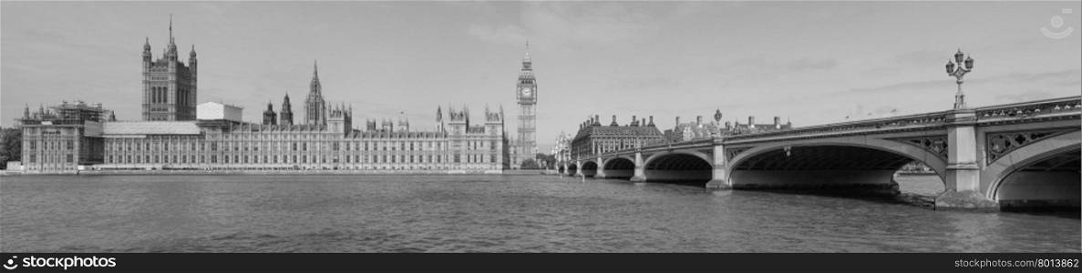 Black and white View of London. LONDON, UK - JUNE 10, 2015: High resolution panoramic view of the Houses of Parliament Big Ben and Westminster Bridge seen from river Thames in black and white