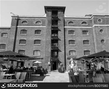 Black and white West India Quay in London. LONDON, UK - JUNE 11, 2015: West India Quay in Docklands in black and white