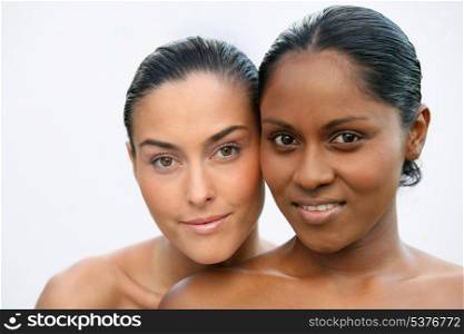 black and white woman posing together