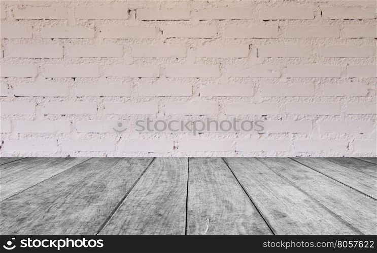 Black and white wooden table top with brick wall decorated in coffee shop