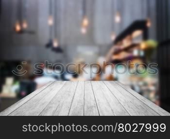 Black and white wooden with blurred background in coffee shop, stock photo