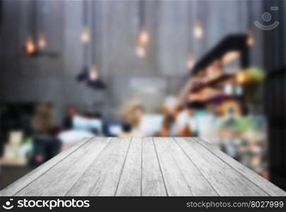 Black and white wooden with blurred background in coffee shop, stock photo