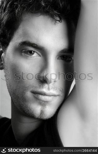 black and white young man face portrait looking camera