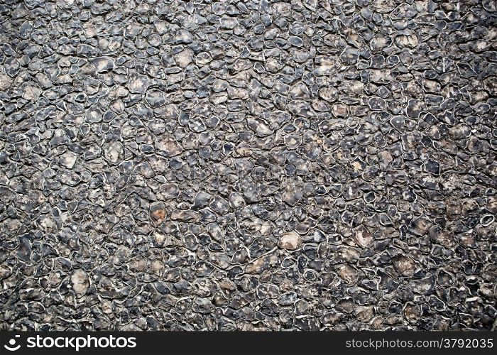 Black asphalt texture, useful as background for design works