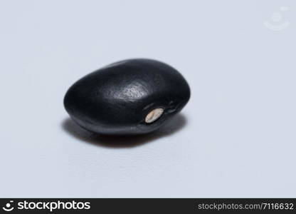 Black beans, white background.