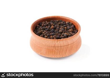 Black bell pepper in a wooden plate