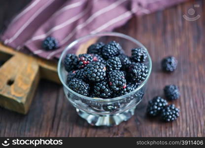 black berries in bowl on a table