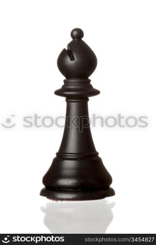 Black bishop chess piece isolated on white background with reflection on the floor