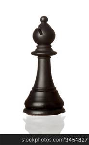 Black bishop chess piece isolated on white background with reflection on the floor