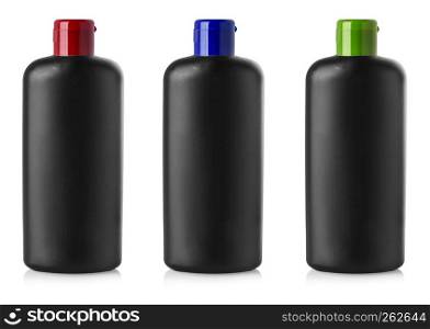 Black blank plastic bottles with colored can on isolated background