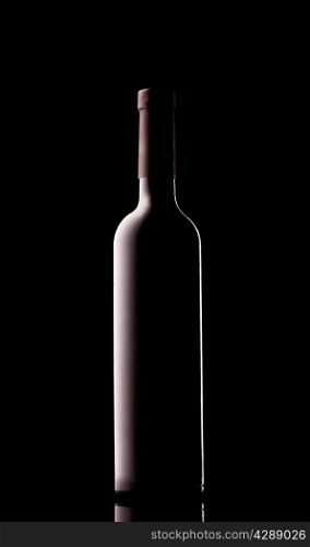Black bottle of wine on a black background
