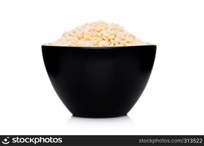 Black bowl with natural organic granola cereal corn rice on white