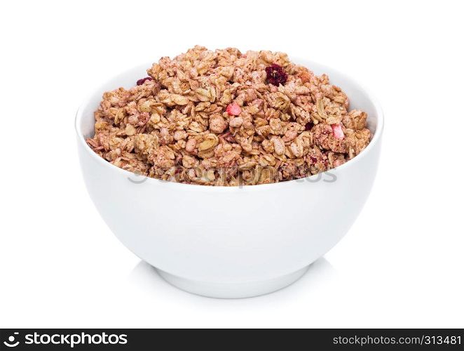 Black bowl with natural organic granola cereal with summer fruits on white