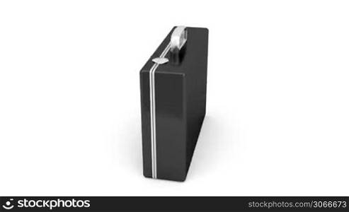 Black briefcase rotates on white background