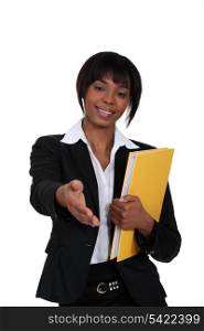 black businesswoman holding filer