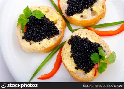 Black caviar served on bread