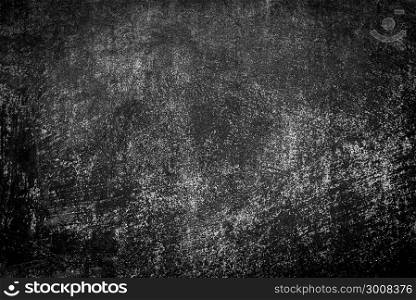 Black Chalkboard blackboard chalk texture background. Black chalk board texture empty blank with writing chalk traces erased on the board.Copy space for text advertisement. School board display.
