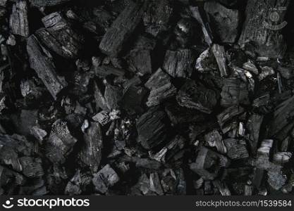 Black charcoal texture abstract surface background. Top view. Black charcoal background