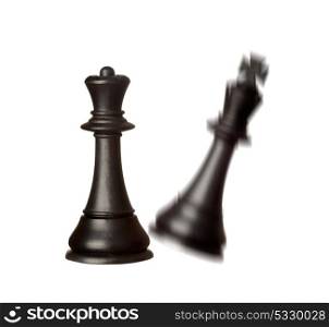 Black chess pieces on a white background