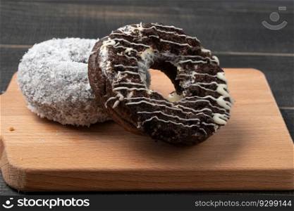 Black chocolate donut And white coconut donut