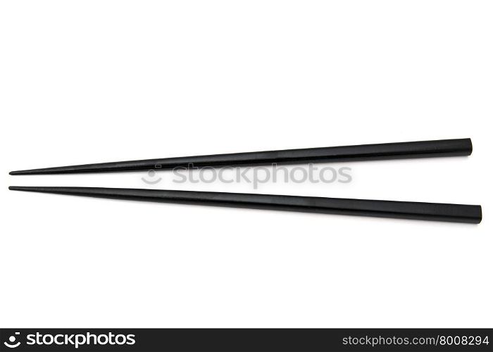 Black chopsticks isolated on white background