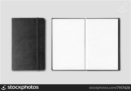 Black closed and open notebooks mockup isolated on grey. Black closed and open notebooks isolated on grey