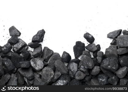 Black coal isolated on white background. Empty room for text. Top view