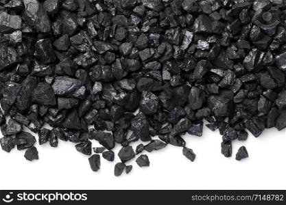 Black coal isolated on white background. Pea coal. Copy space, top view, flat lay