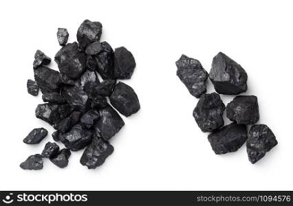 Black coal pile isolated on white background. Top view, flat lay