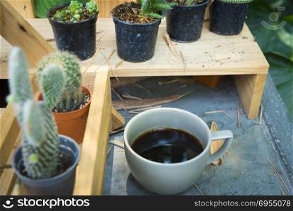 black coffee with cactus