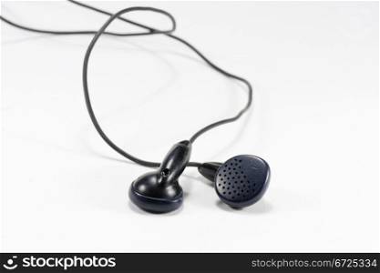 black color earphones to listen to music or talking on the mobile