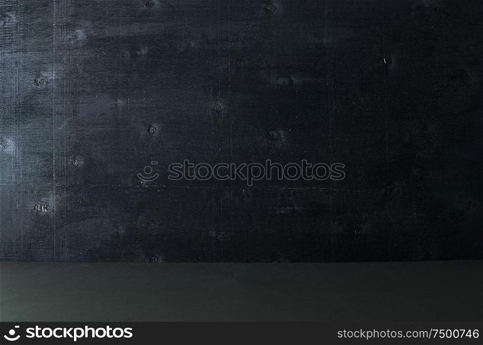 Black color wooden background.