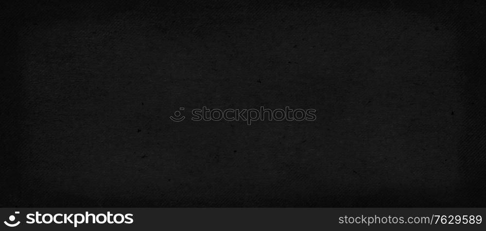 Black colored old paper texture with matt fibrous structure. Dark grunge rough background to be used as blackboard for educational projects. Blank chalkboard, ready for sketches, copy paste sheet.