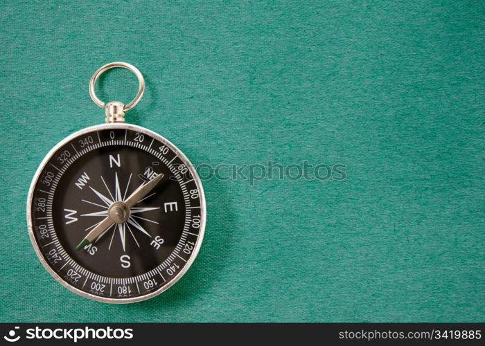 black compass on the blue background