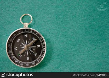 black compass on the blue background