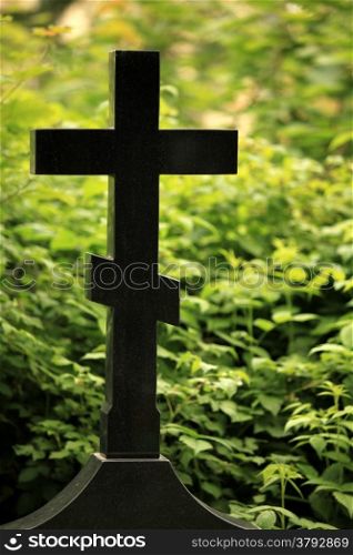 black cross gravestone