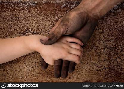 black dirty man hands holding kid clean hand concept