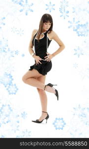 black dress brunette on high heels with snowflakes