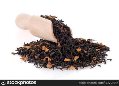 Black Dry Tea with a Wooden Spoon on white reflective background.