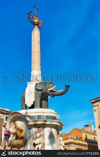 Black elpehant with obelisk on its back in Piazza del Duomo in Catania - symbol of the city of Catania. Sicily, Italy. Created by the architect Giovanni Battista Vaccarini around the 1736