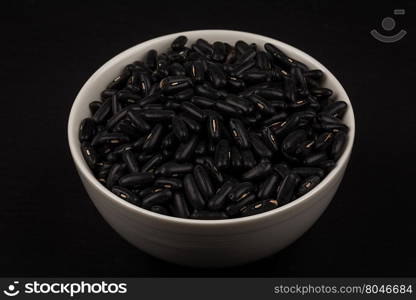Black eyed peas beans on a dark background