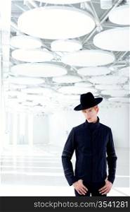 black far west modern fashion man with hat in modern indoor