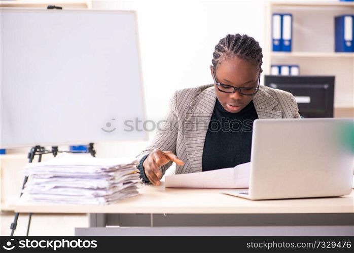Black female employee unhappy with excessive work