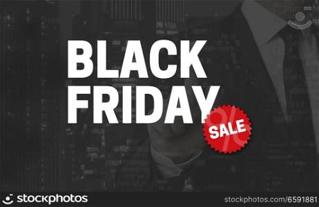 Black Friday concept is shown by businessman.. Black Friday concept is shown by businessman
