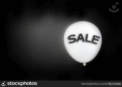 Black Friday concept. Quote Black Friday on black balloon. Flat lay, top view. Black Friday background with copy space .. Black Friday concept. Quote Black Friday on black balloon. Flat lay, top view. Black Friday background with copy space and text SALE