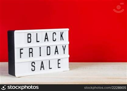 Black Friday concept. Sign on a red background. Place for text.. Black Friday concept. Sign on red background.