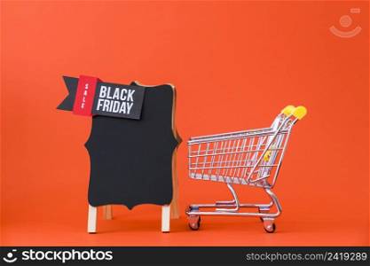 black friday decoration with small cart board